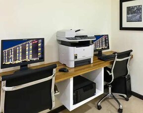 dedicated business center with PC, internet, printers, and work stations at Hampton by Hilton Vadodara-Alkapuri.