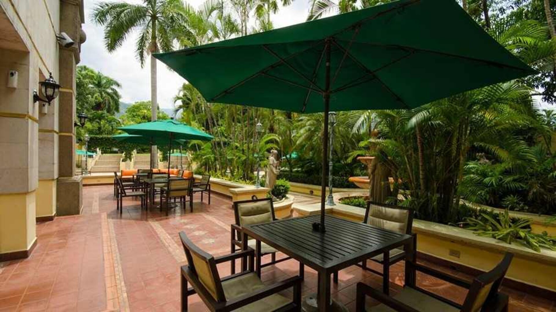pretty outdoor terrace with seating area ideal for coworking at Hilton Princess San Pedro Sula.