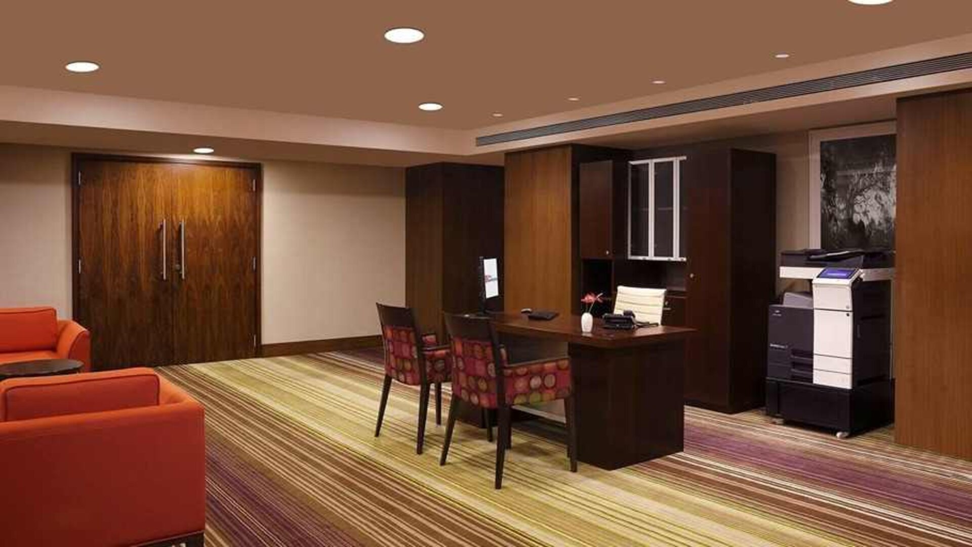 dedicated business center with PC, business desk, printer, and internet at Hilton Garden Inn Trivandrum.