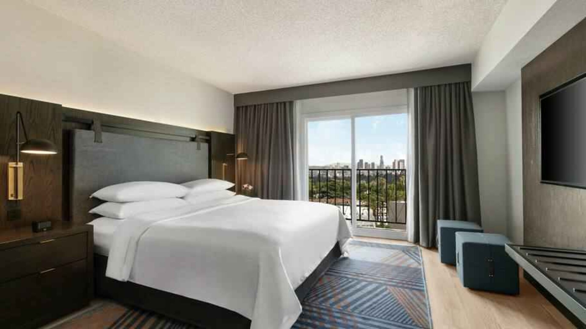 Comfortable king room at the Embassy Suites by Hilton Los Angeles Downey.