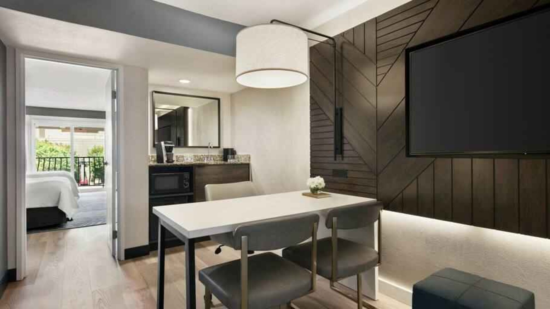 Spacious living room perfect as workspace at the Embassy Suites by Hilton Los Angeles Downey.