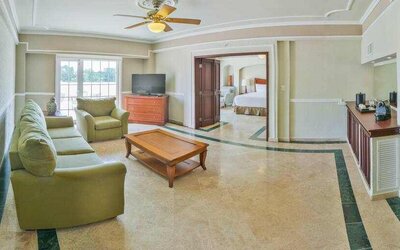 Living room in a hotel suite at the Villa Mercedes Merida, Curio Collection by Hilton.