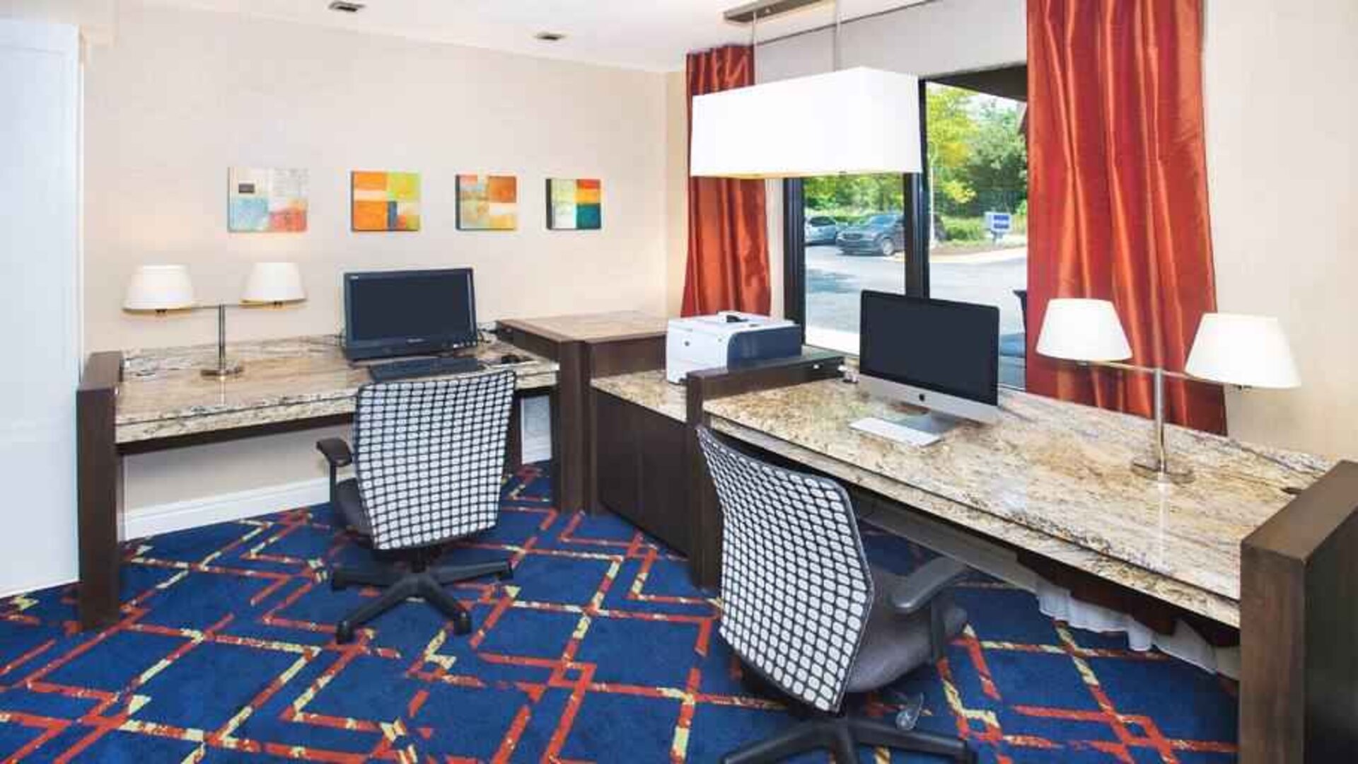 dedicated business center equipped with PCs, internet, printers, and work desk ideal for working remotely at Hampton Inn & Suites Annapolis.