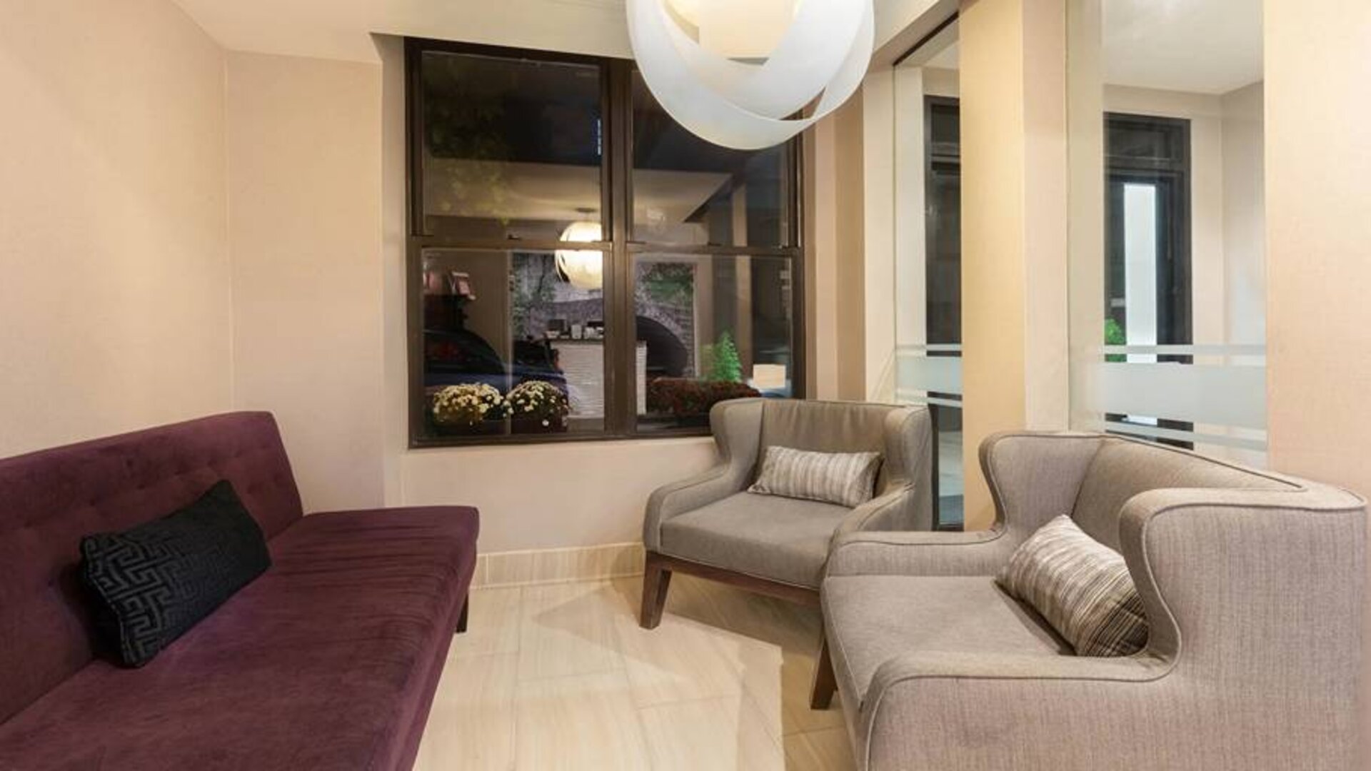 Lobby area at La Quinta Inn & Suites By Wyndham New York City Central Park.