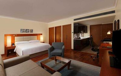 Comfortable king bedroom at the Hilton Bangalore Embassy GolfLinks.