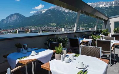 Outdoor terrace perfect as workspace at the Tivoli Innsbruck.