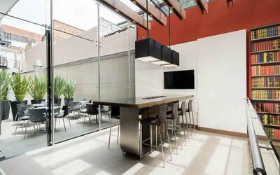 Bright hotel workspace at the Hampton By Hilton Bogota Usaquen.