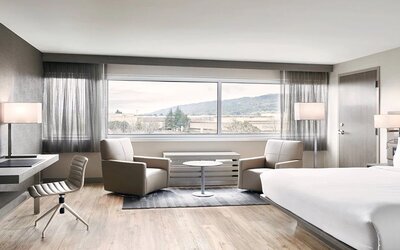 King bedroom with working station at the AC Hotel By Marriott Pleasanton.