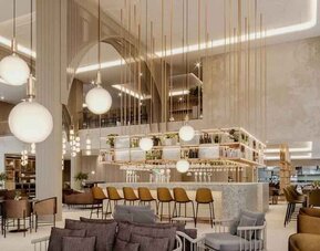 Stylish lobby workspace at the Hilton Garden Inn Peterborough City Centre.