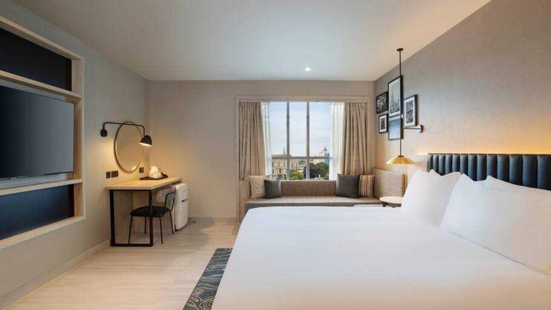 Hotel room with TV screen and desk at the Hilton Garden Inn Peterborough City Centre.