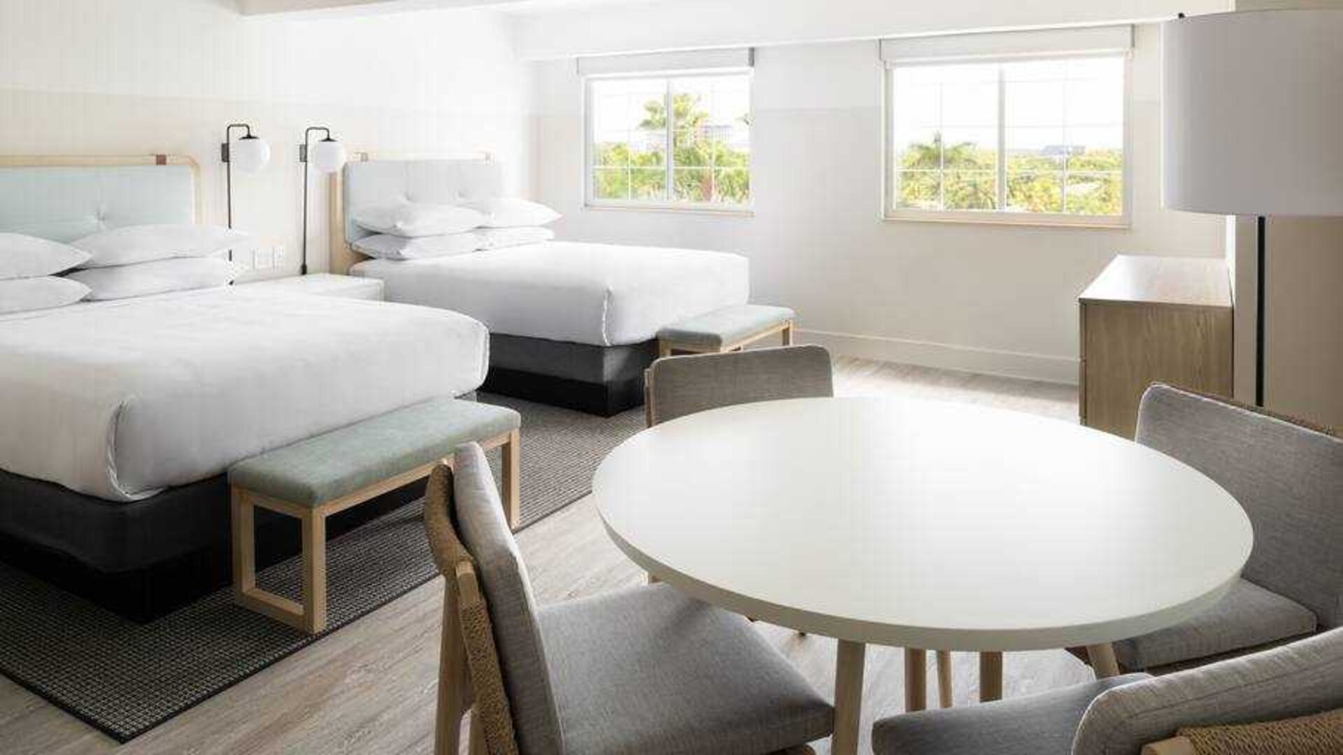 Twin room with working station at the Hampton By Hilton Grand Cayman.