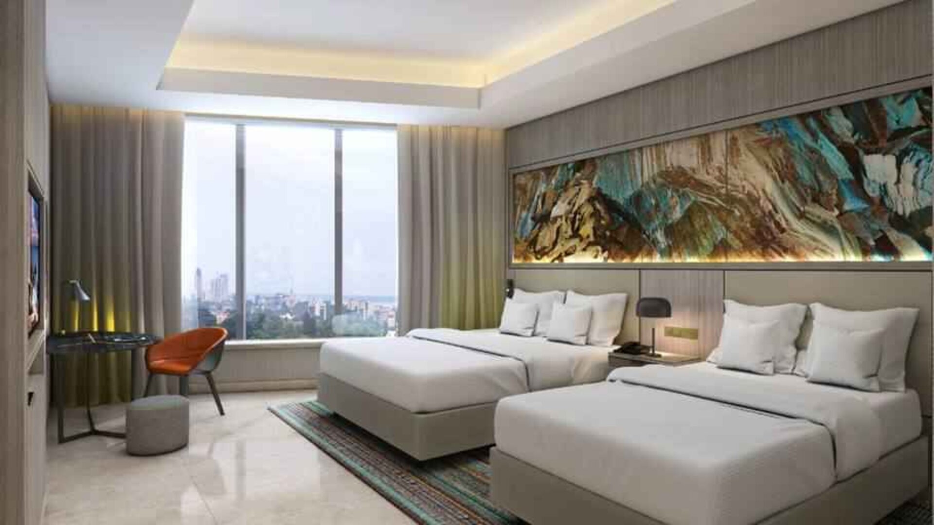 Twin room with desk at the Hilton Kinshasa.