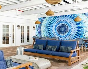 Seating area perfect as workspace at Blue Moon Hotel.