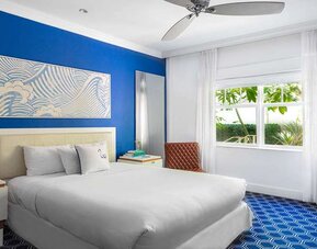 Bright hotel room at Blue Moon Hotel.