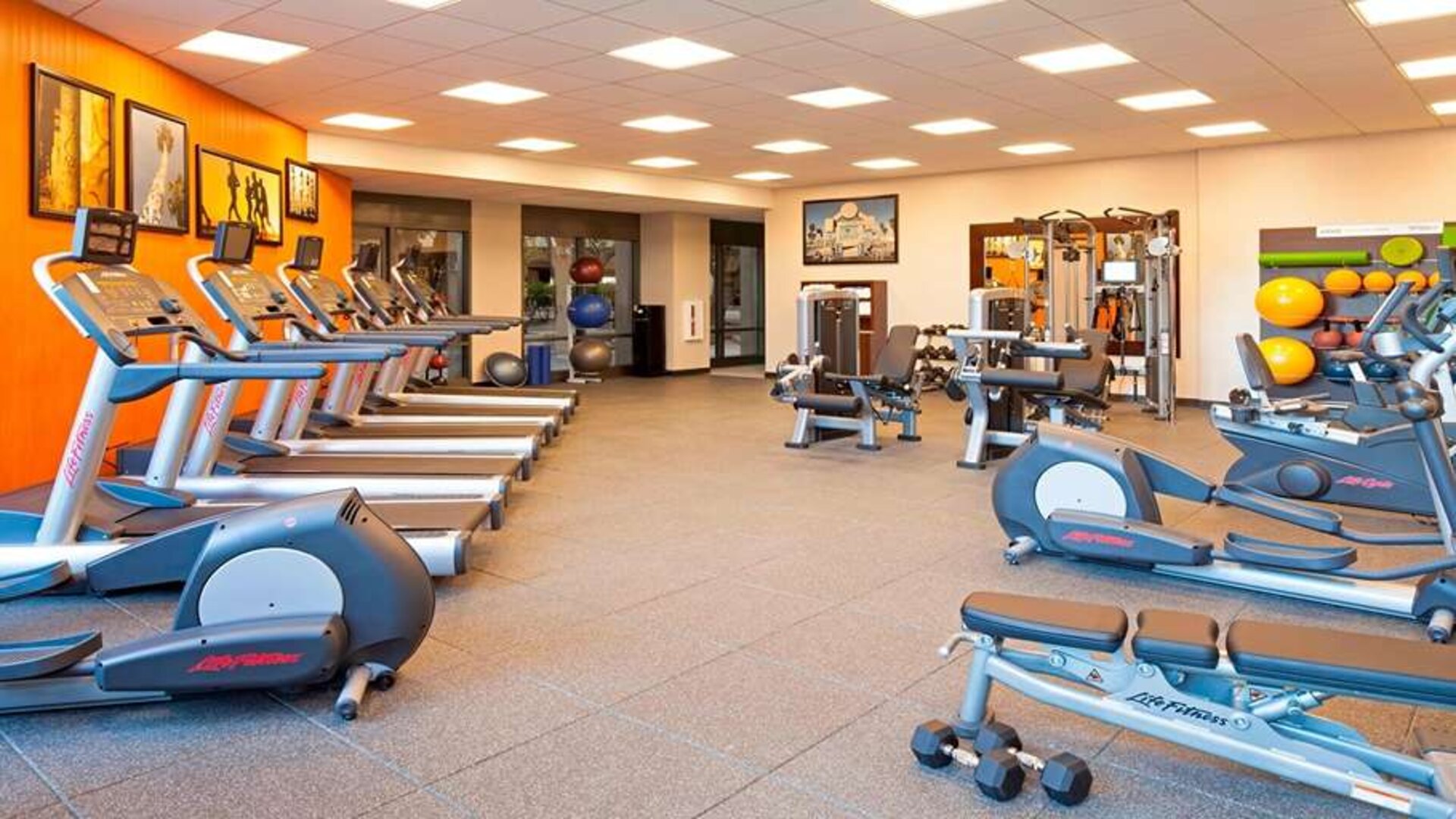 Fitness center with treadmills at Residence Inn By Marriott LAX Airport.