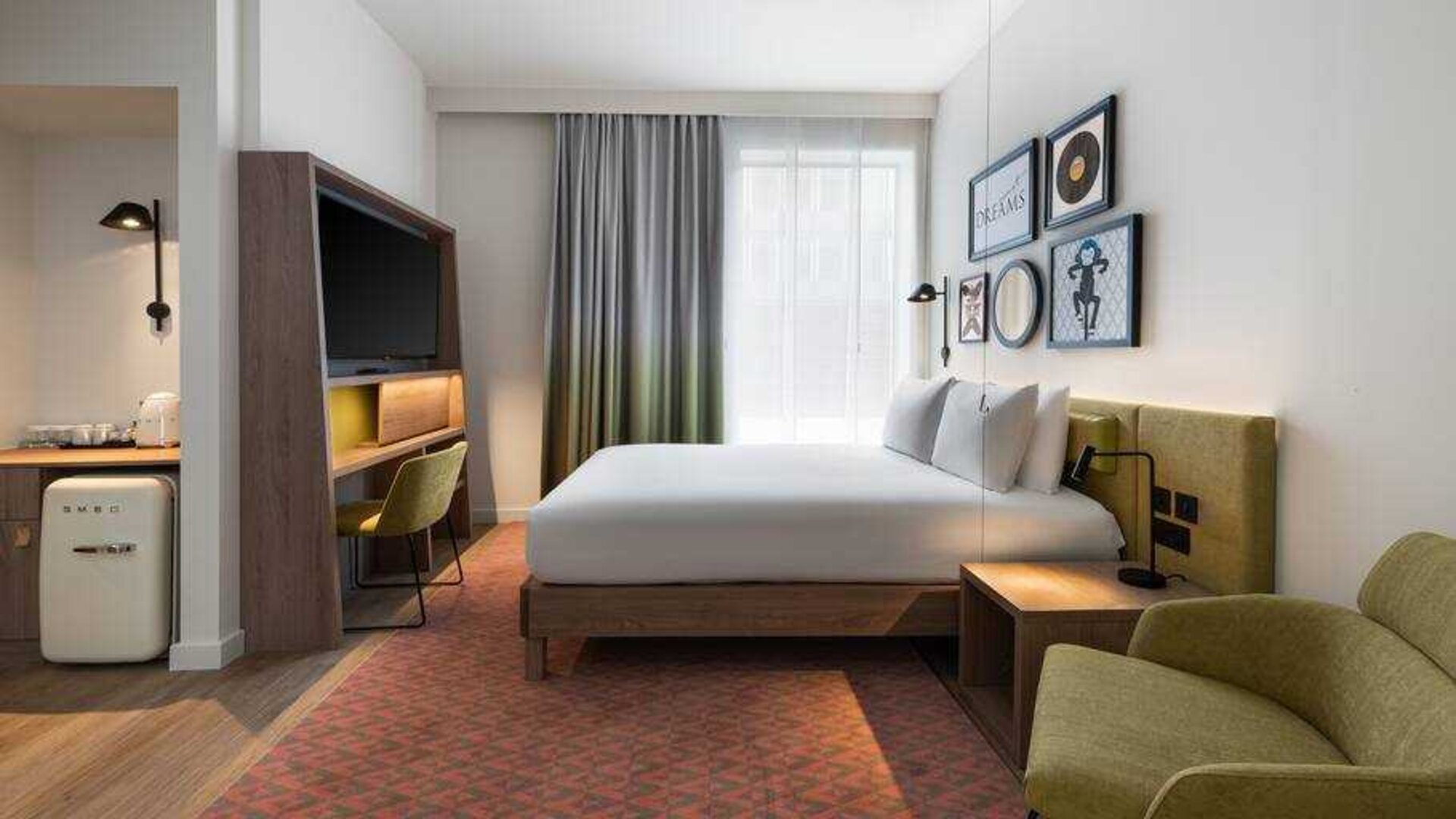 King bedroom with workstation at the Hampton by Hilton Istanbul Arnavutkoy.