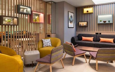 Elegant hotel workspace with sofa at the Hampton by Hilton Istanbul Arnavutkoy.