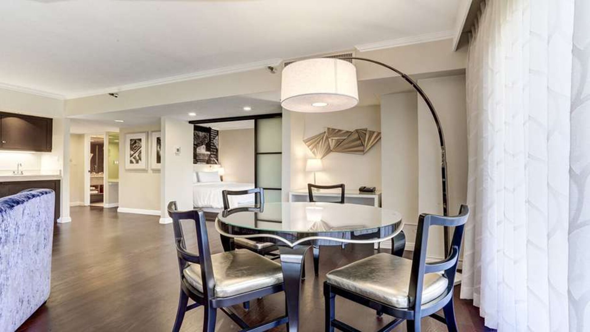 Living room perfect as workspace at Avenue Of The Arts Hotel.