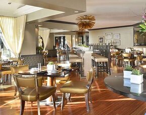 Dining area perfect for co-working at Avenue Of The Arts Hotel.