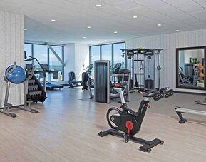 Fitness center available at H Hotel Los Angeles, Curio Collection By Hilton.
