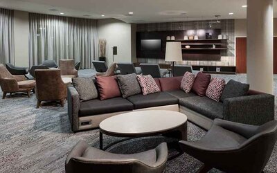 Lobby and coworking lounge at Courtyard Miami Dolphin Mall.