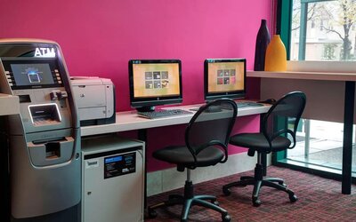 Well equipped business center with PC, internet, and printer at Courtyard By Marriott New York JFK Airport.