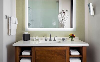 Guest bathroom with shower at The Ambrose Hotel Santa Monica.