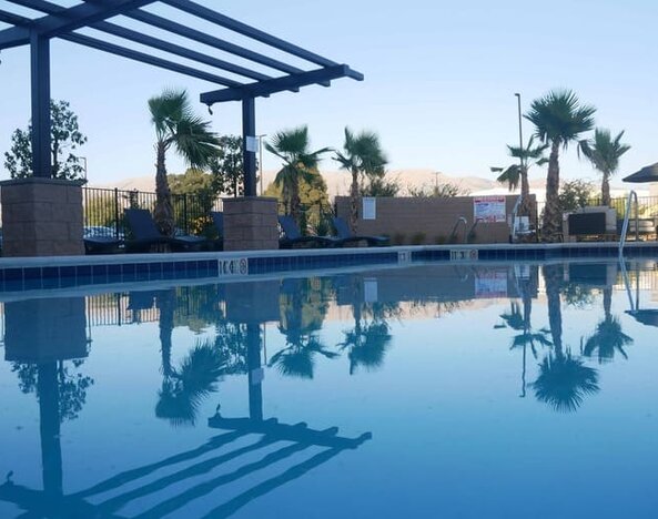 Refreshing outdoor pool at Holiday Inn & Suites Silicon Valley - Milpitas.