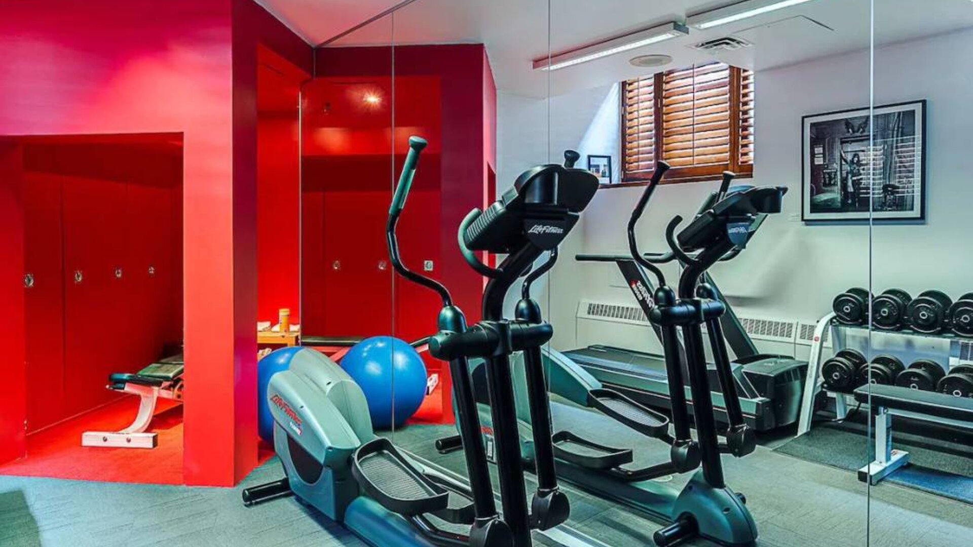 The hotel fitness center has both weights and exercise machines.