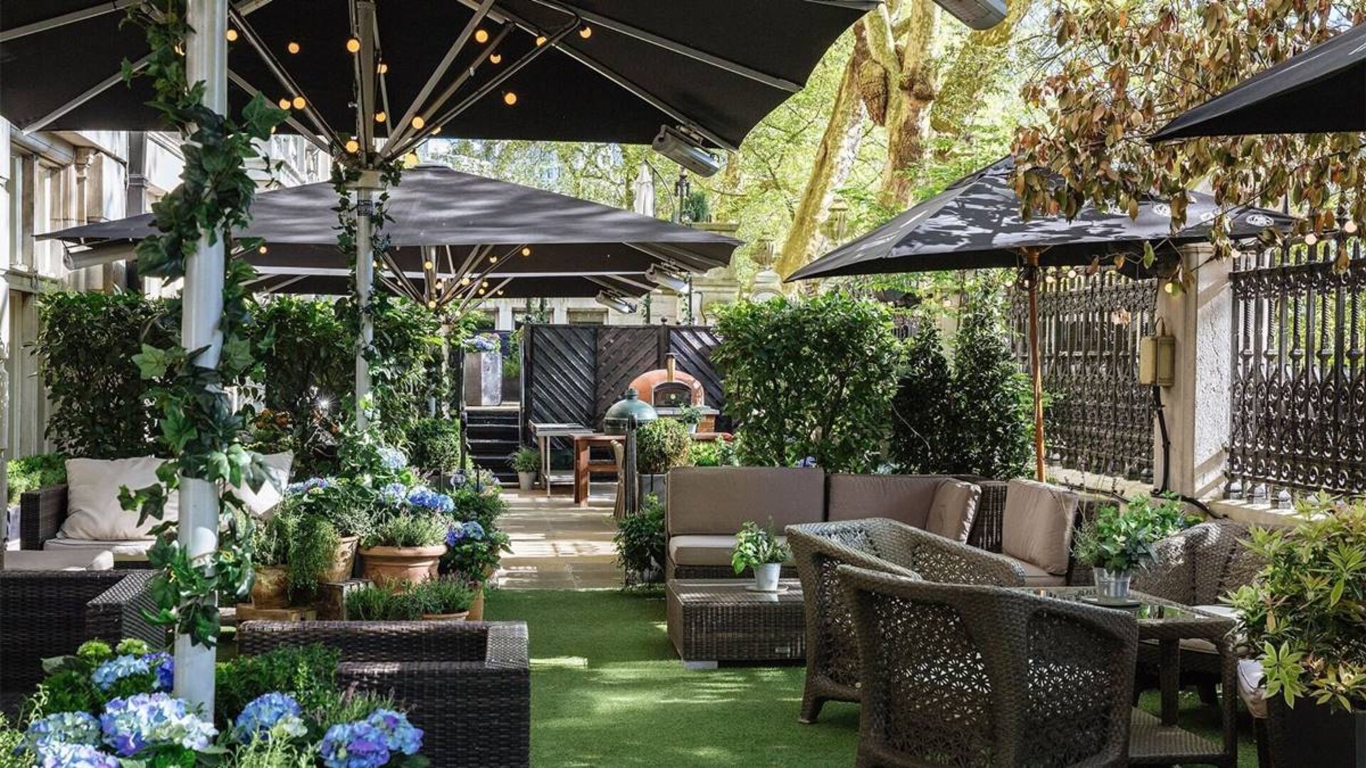 The Terrace, a green space outside with seating for social events and casual dining.