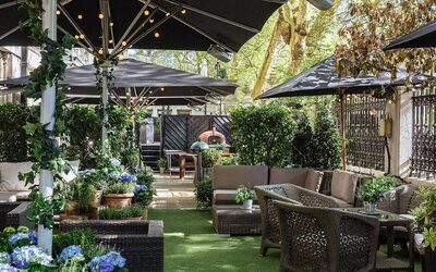 The Terrace, a green space outside with seating for social events and casual dining.