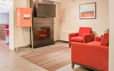 The hotel’s lobby has comfortable seating and a widescreen TV.