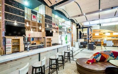 The Gastro Bar of TRYP By Wyndham Times Square South, with both bar stools and soft seats.