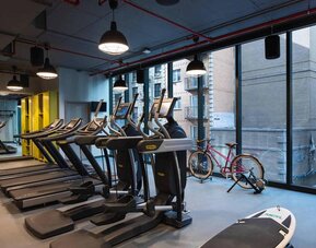 Assorted exercise machines can be used in the hotel’s fitness center.