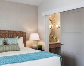 Romantic king room with private bathroom at Sea Crest Beach Hotel.