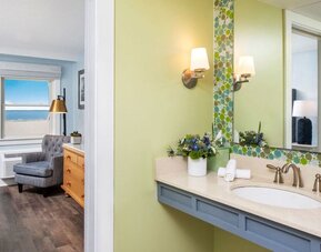 Luxurious king room with private bathroom at Sea Crest Beach Hotel.