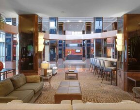 Lobby and coworking lounge at Hilton Newark Airport.