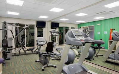Well equipped fitness center at Holiday Inn Express & Suites Ontario.