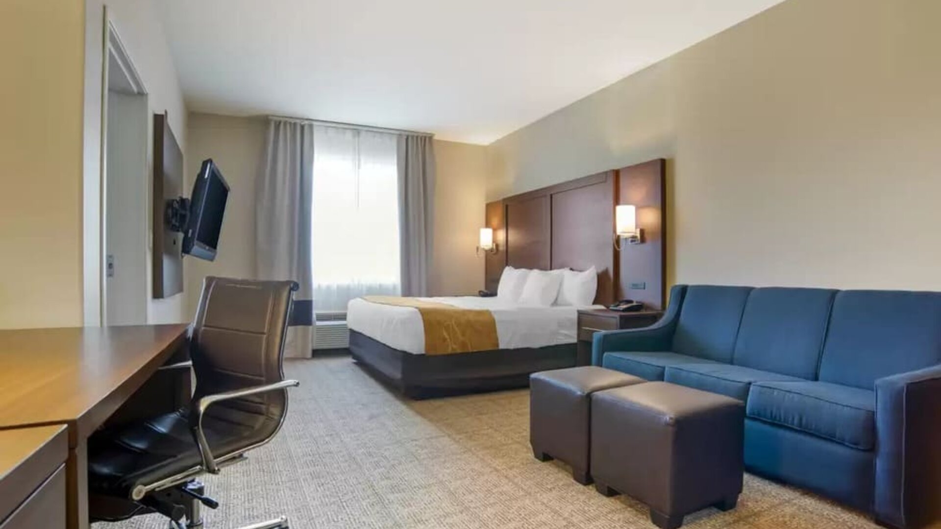 Spacious delux king with work station and TV at Comfort Suites Alexandria, LA.