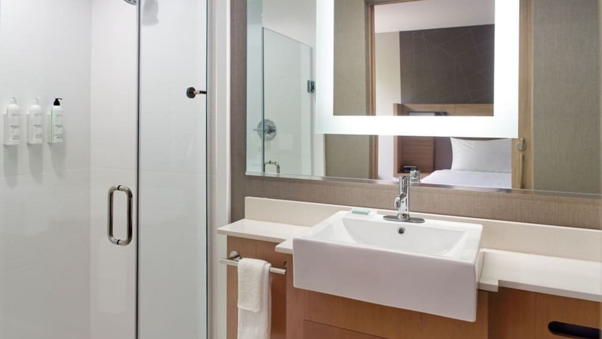 Private guest bathroom with shower at SpringHill Suites Atlanta Northwest.