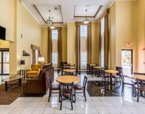 Dining area perfect for coworking at Sleep Inn & Suites Stafford - Sugar Land.