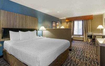 Day use room with work desk and sofa at Best Western Plus Mountain View Auburn Inn.