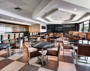 Dining area perfect for coworking at Travelodge Absecon Atlantic City.