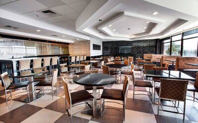 Dining area perfect for coworking at Travelodge Absecon Atlantic City.