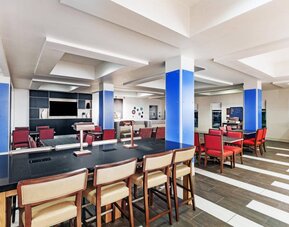 Dining area perfect for coworking at Holiday Inn Express & Suites Shreveport South - Park Plaza.