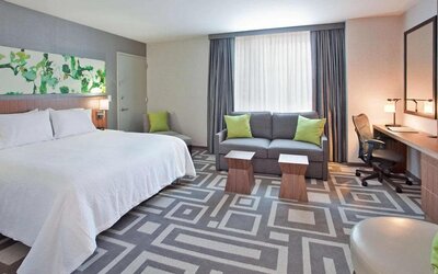 Guest room in Hilton Garden Inn New York Central Park South Mid-town West, with workspace desk and chair.