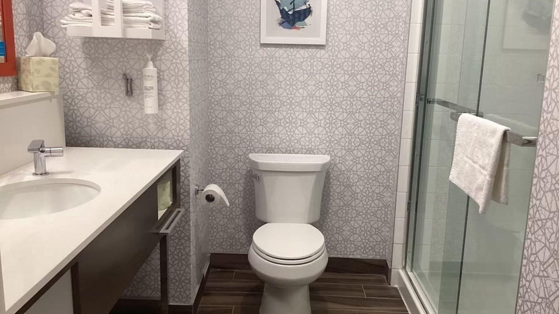 Private guest bathroom with shower at Hampton Inn By Hilton Port Hope.