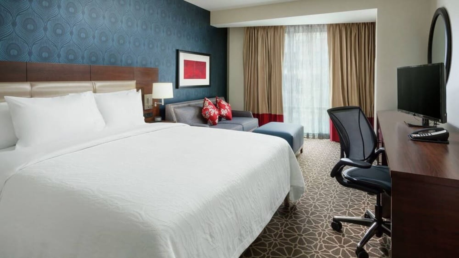 Delux king room with TV and work space at Hilton Garden Inn Washington DC / Georgetown Area.