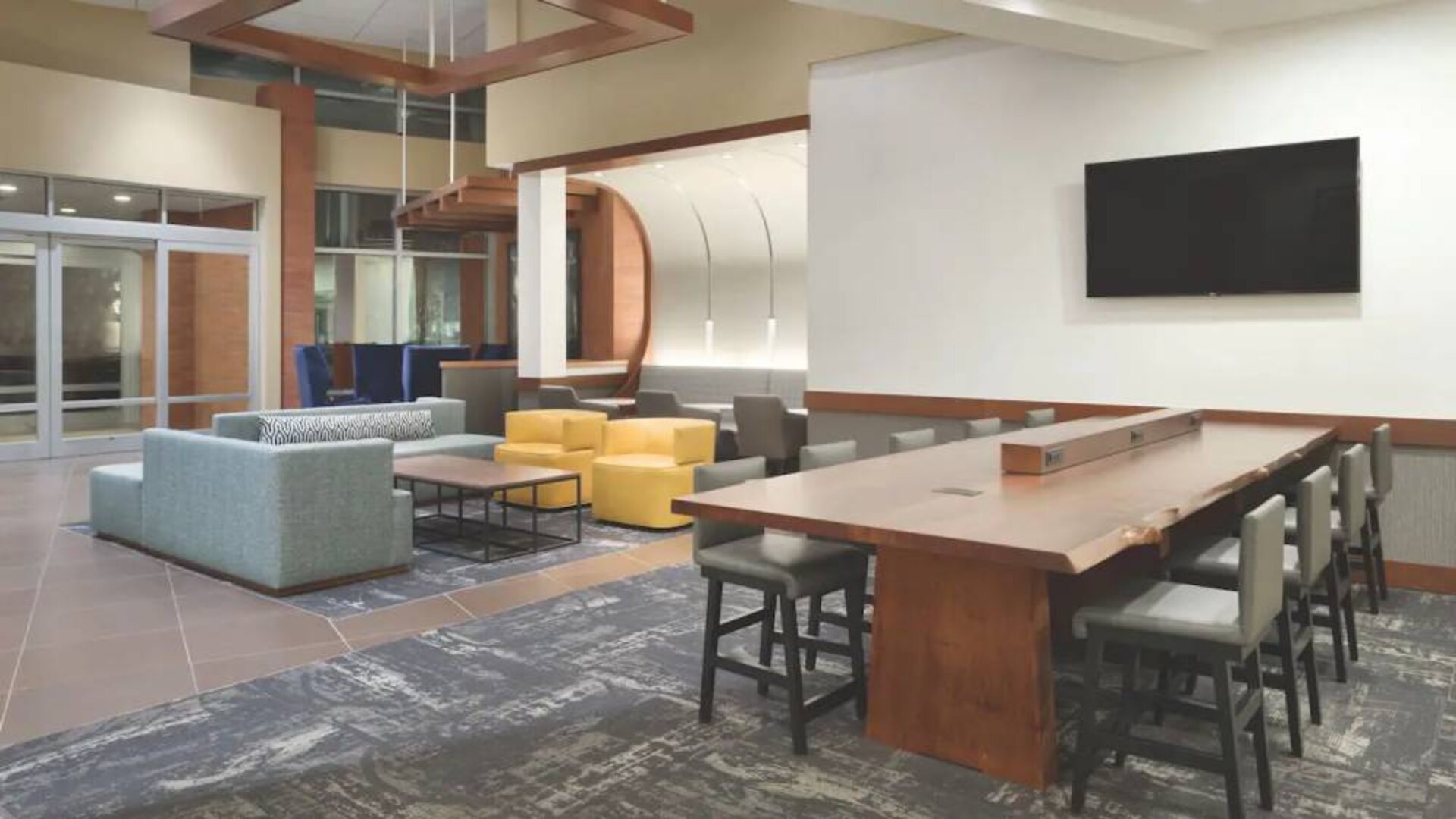 Lobby and coworking lounge at Hyatt Place Portland Airport At Cascade Station.