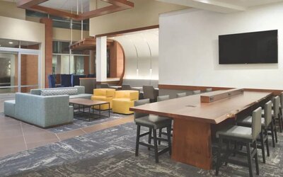 Lobby and coworking lounge at Hyatt Place Portland Airport At Cascade Station.